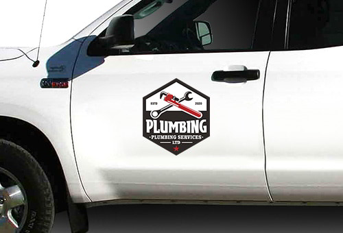 Plumbing company sticker on a truck